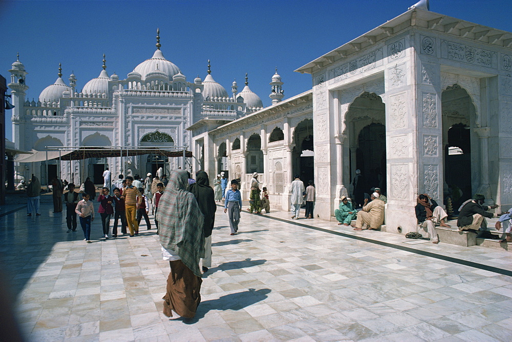 Groups of people at the Data Durbar Shrine in Lahore, Pakistan, Asia