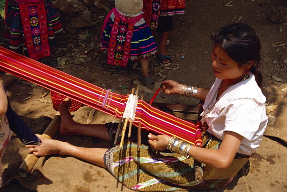 Meo hill tribe woman weaving, near Chiang Mai, Thailand, Southeast Asia, Asia