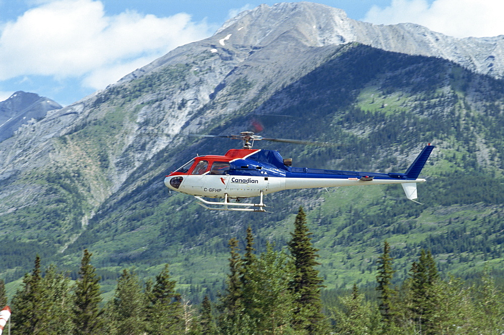 Helicopter in the Rocky Mountains, British Columbia, Canada, North America