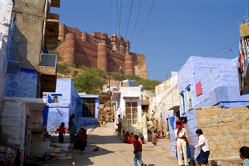 Street scene with typical blue houses of Brahmin caste residents of city, Jodhpur, Rajasthan state, India, Asia