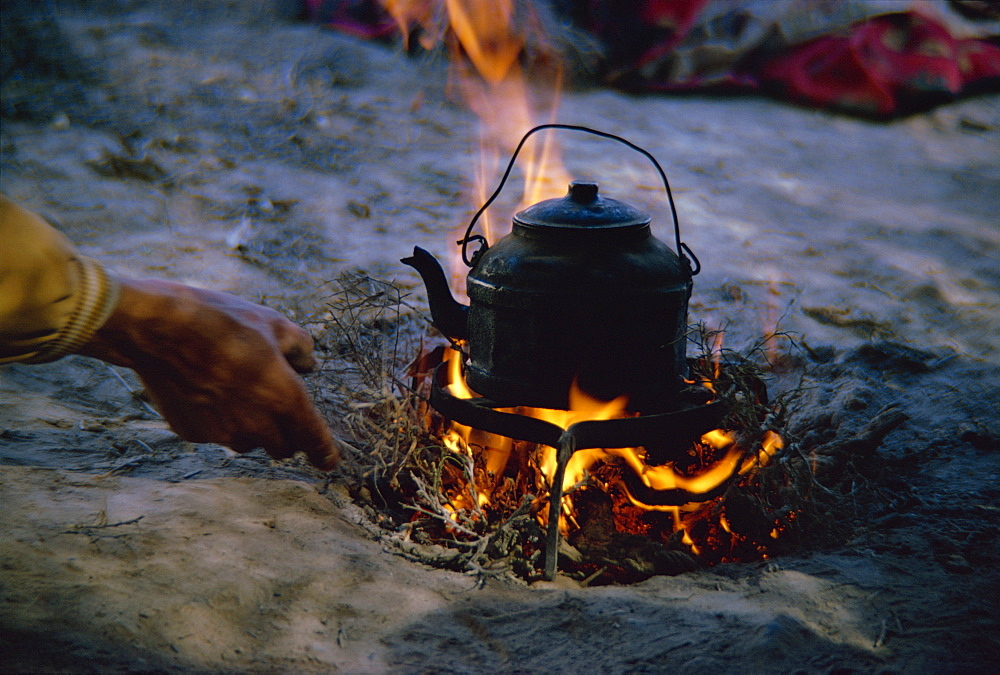 Kettle on fire in Qashqai camp, southern area, Iran, Middle East