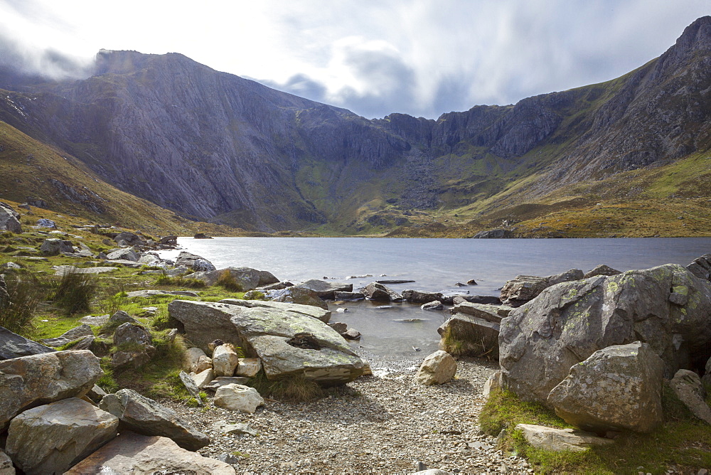 A small unnamed source in the Ogwen Valley (Dyffryn Ogwen) with the Glyderau mountain range behind, Gwynedd, Snowdonia National Park, Wales, United Kingdom, Europe 