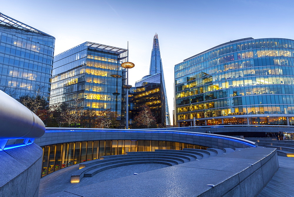 The scoop, an amphitheatre next to the GLC building, at More London with the Shard behind, London Bridge, London, England, United Kingdom, Europe