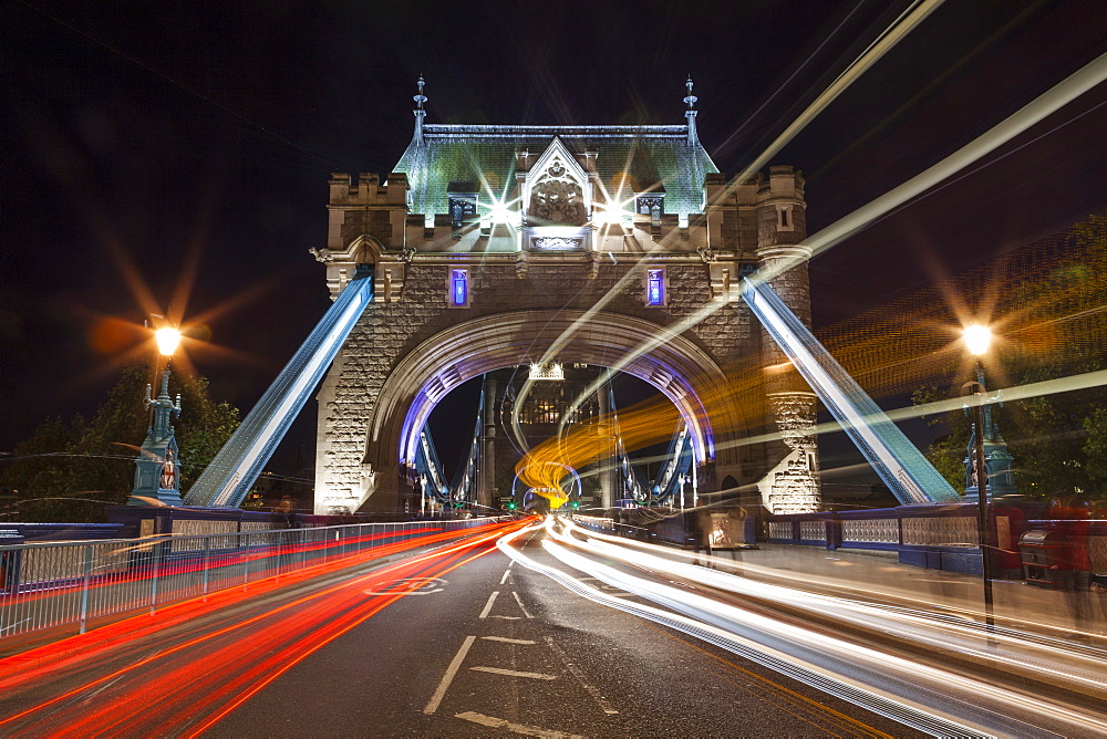 Long exposure of traffic over Tower Bridge at dusk, London, England, United Kingdom, Europe