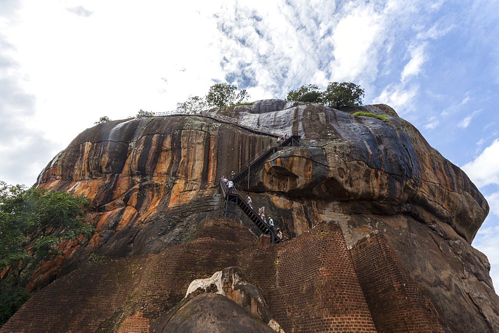 Tourists ascending Sigiriya (Lion Rock), UNESCO World Heritage Site, Sri Lanka, Asia 