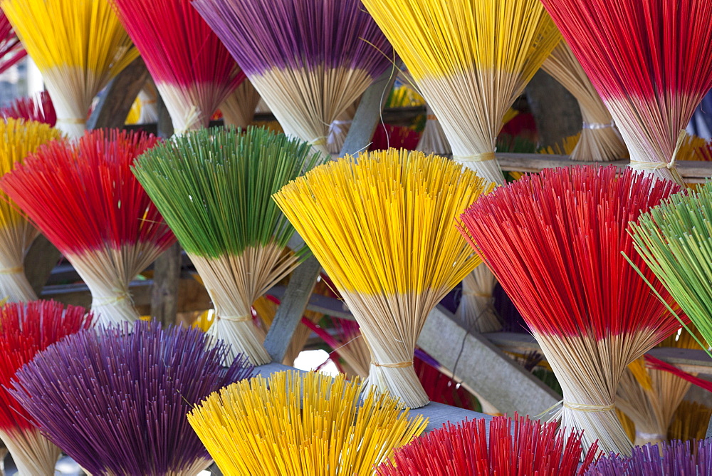 Bundles of incense sticks for sale, made by traditional craftsmen from Thuy Zuan Hat village along the road to the Tu Duc Royal Tomb, Hue, Vietnam, Indochina, Southeast Asia, Asia