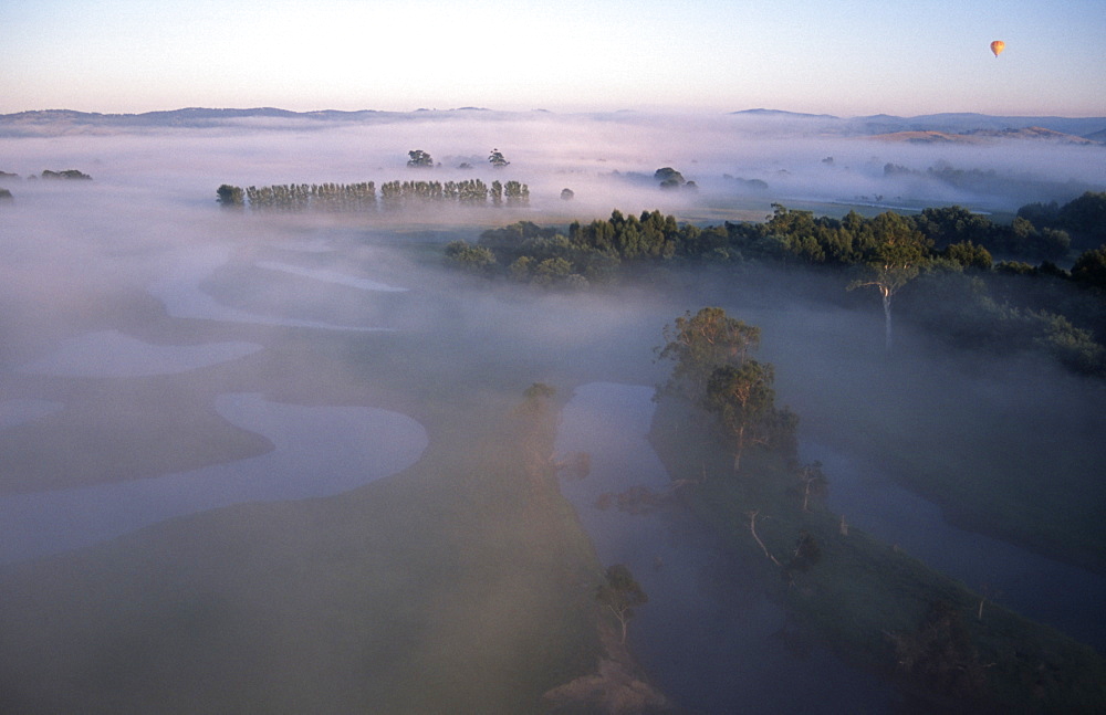 Hot air balloon flying over Yarra Valley, Victoria, Australia