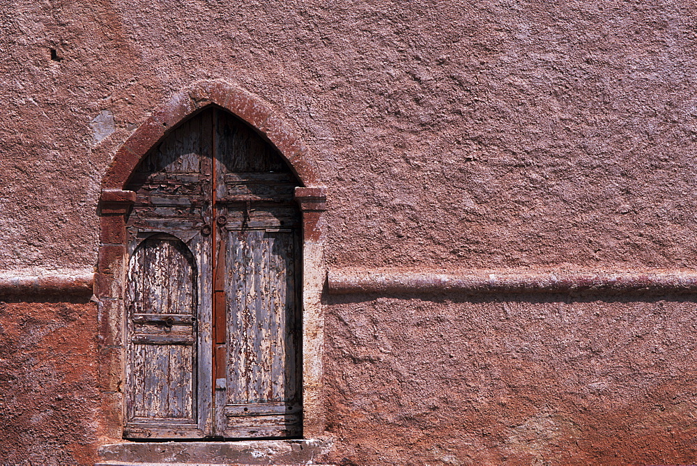 Door into the city walls of Essaouira, Morocco