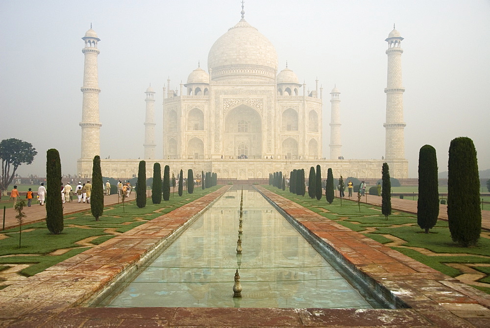 Taj Mahal tomb through early morning mist and atmosphere, Agra, Uttar Pradesh, India