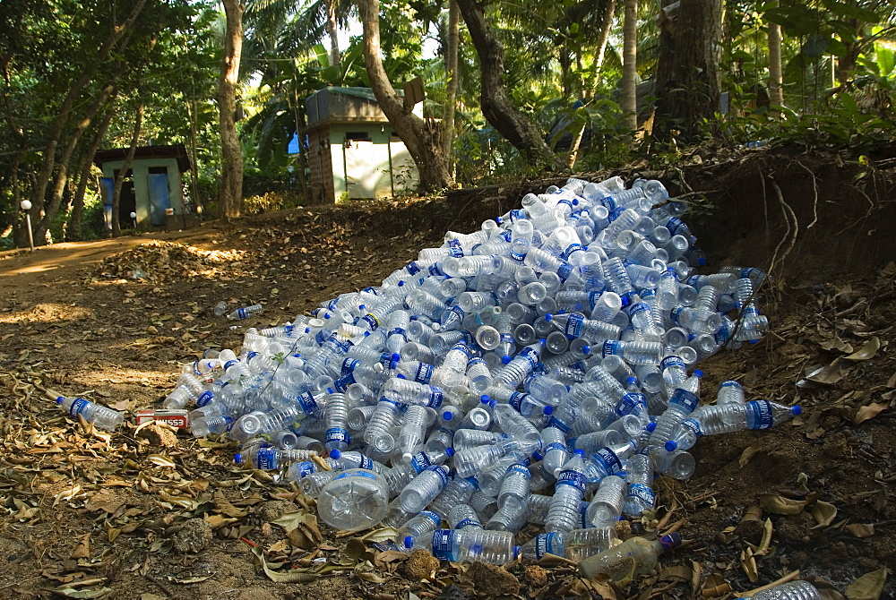 Empty water bottle littered nearby a tourist guest house, Karnataka, India