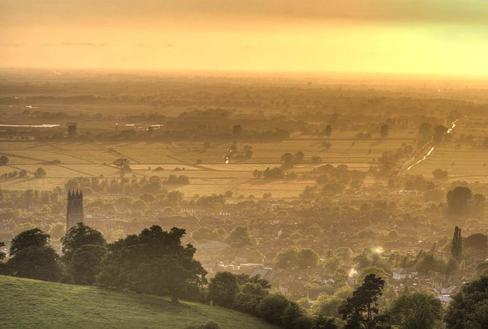 View of Glastonbury during sunset from Glastonbury Tor, Somerset, England, United Kingdom, Europe