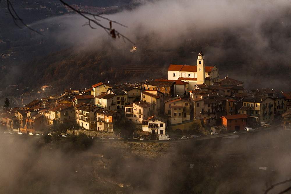 Village of La Bollene Vesubie in the evening mist in the Maritime Alps (Alpes Maritimes), France, Europe