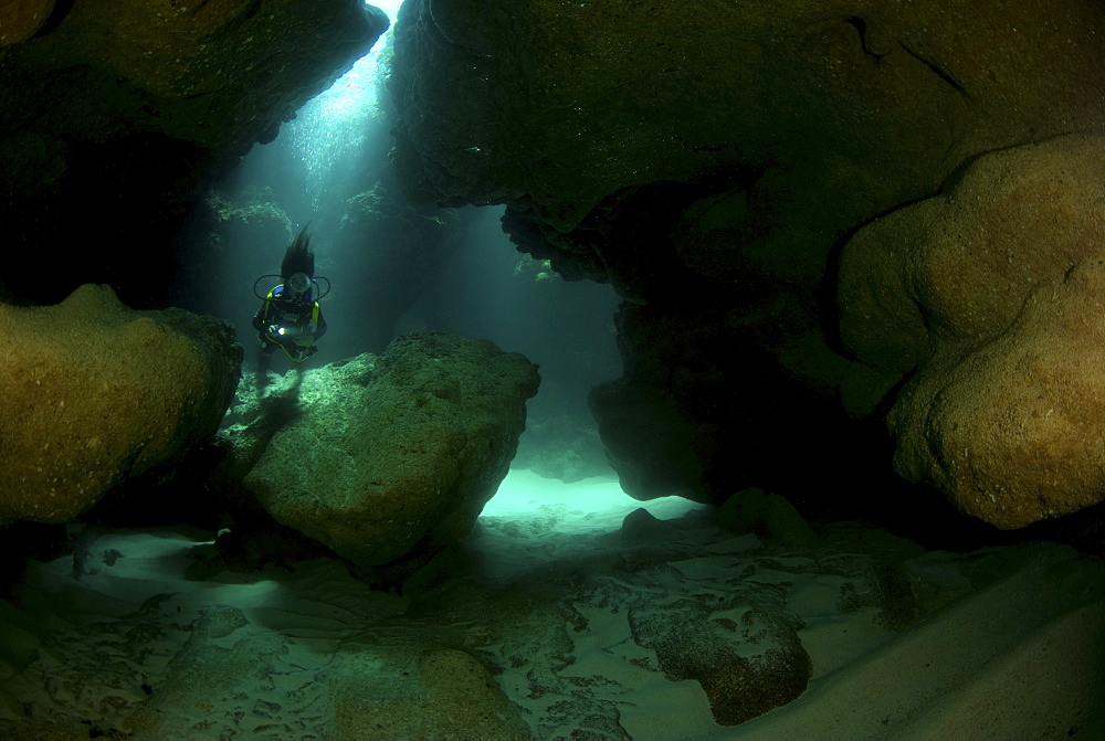 Diver in cave, Anegada, British Virgin Islands