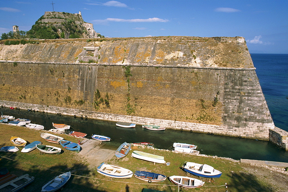 Boats moored below the Old Fort, Corfu, Ionian Islands, Greek Islands, Greece, Europe