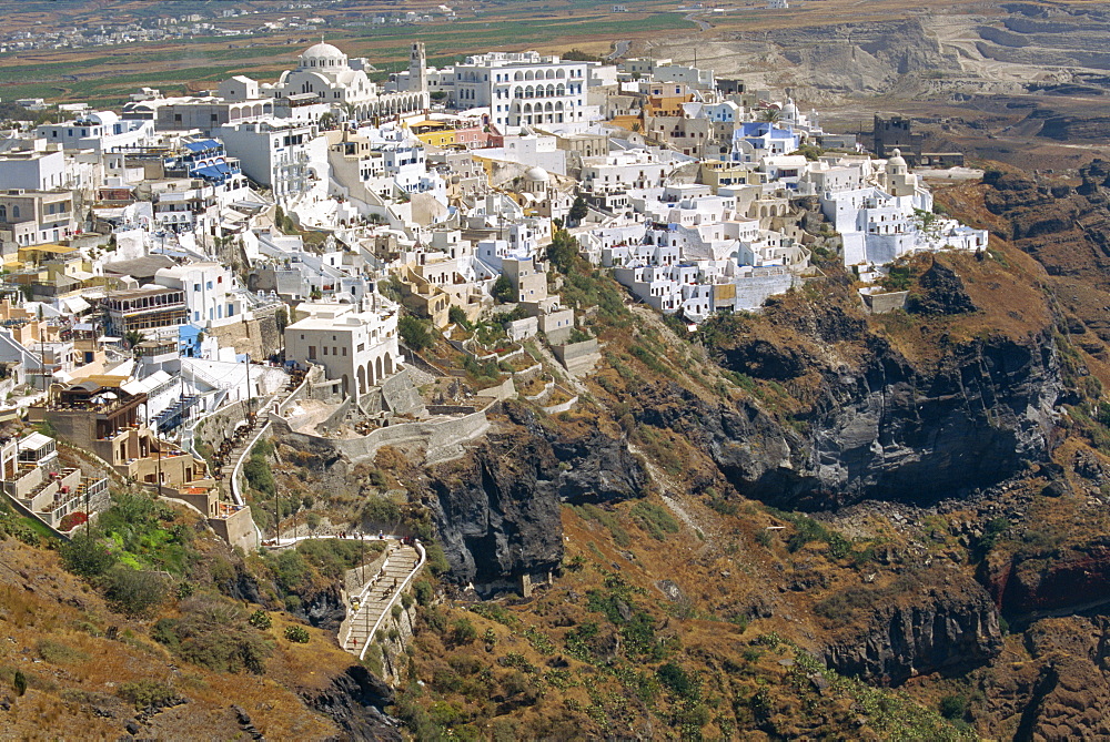 Aerial view over Fira Town, the capital of Santorini (Thira), perched on the Caldera Rim, Cyclades Islands, Greek Islands, Greece, Europe