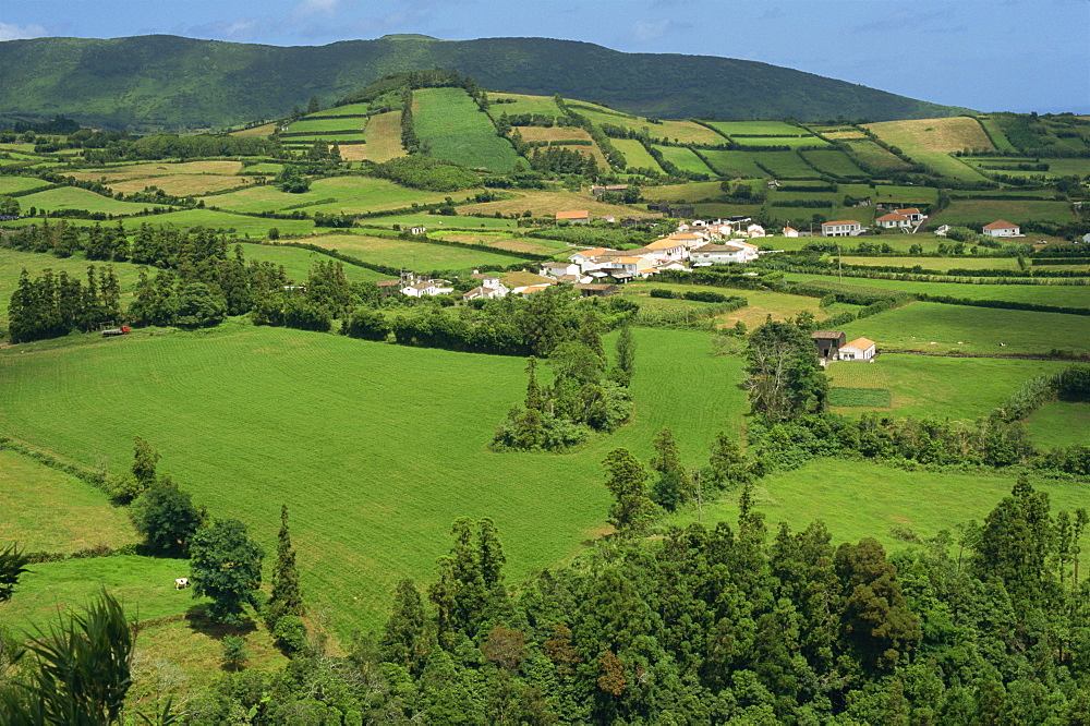 Landscape of fields and small village on the island of Faial, the Azores, Portugal, Atlantic Ocean, Europe