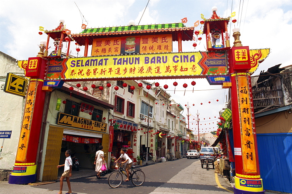 Colourful gateway and street scene in the town of Malacca in Malaysia, Southeast Asia, Asia