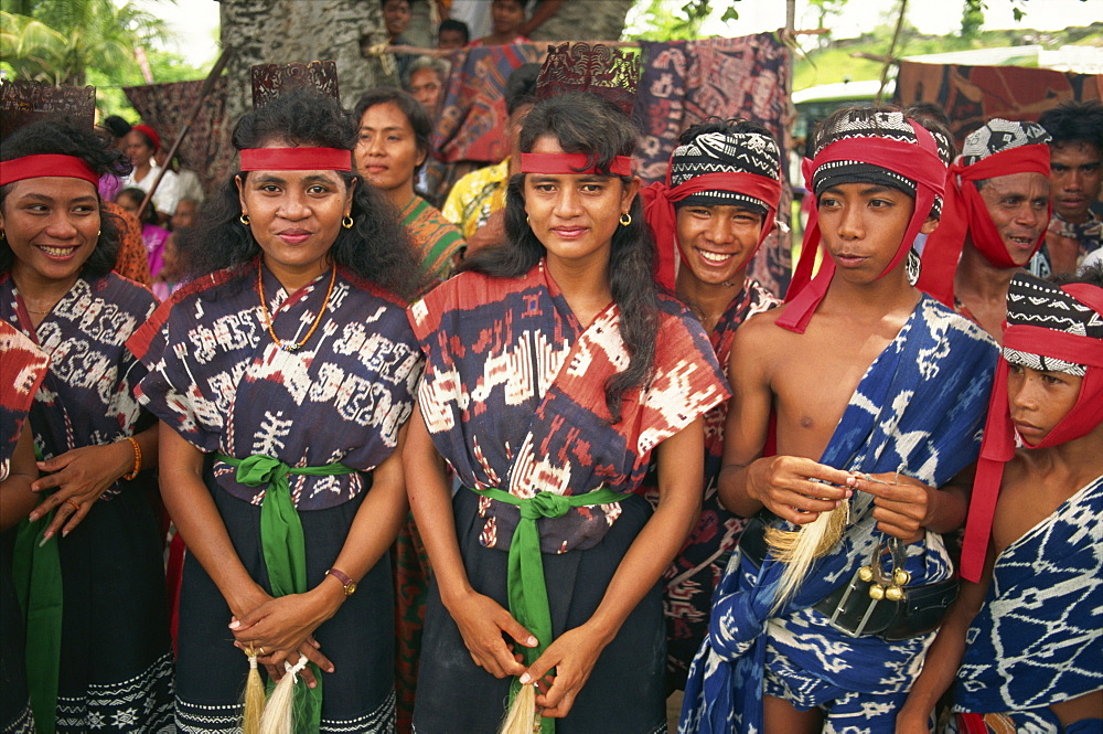 Young people wearing ikat designs, Sumba, Indonesia, Southeast Asia, Asia