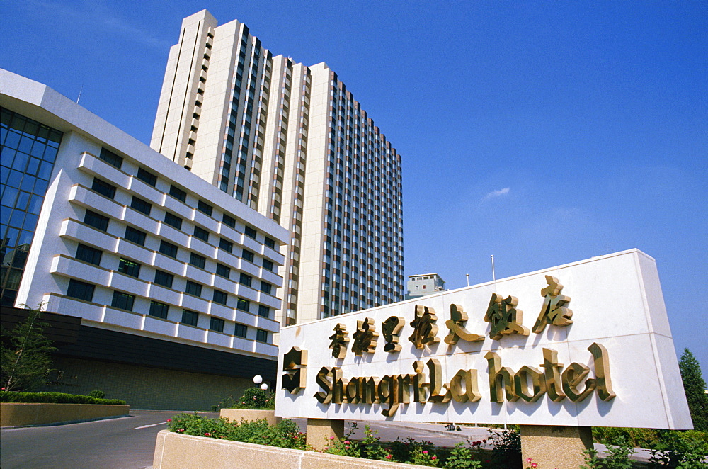 Sign and modern building of the Shangri-La Hotel in Beijing, China, Asia