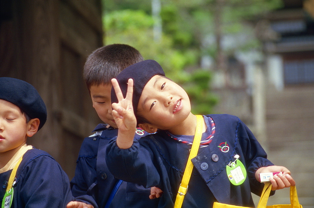 School child at Kofukuji temple, Nagasaki, Japan, Asia