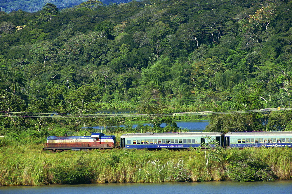 Passenger train on the railway beside the Panama Canal, Panama, Central America