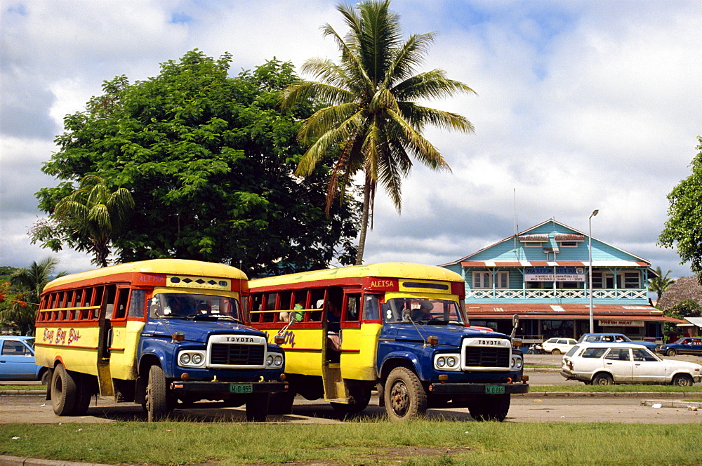 Local buses on a street in Apia, Upolu Island, Western Samoa, Pacific