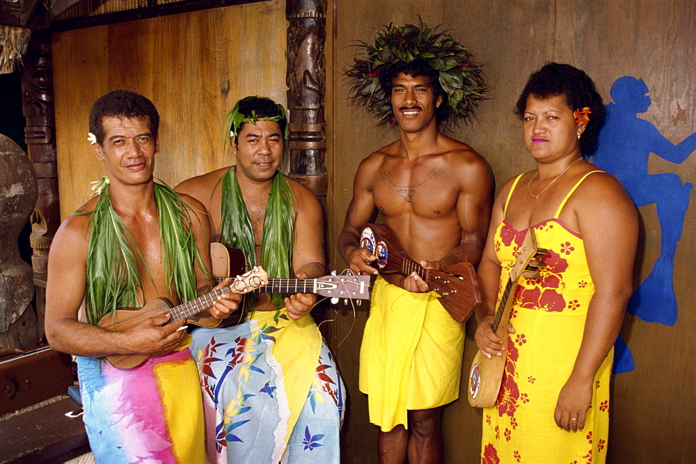 A group of Polynesian musicians welcome visitors to Moorea, Tahiti, Pacific Islands, Pacific