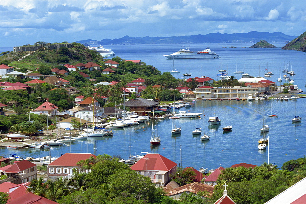 Aerial view over Gustavia, with cruise ship anchored offshore, St. Barthelemy (St. Barts), Leeward Islands, West Indies, Caribbean, Central America