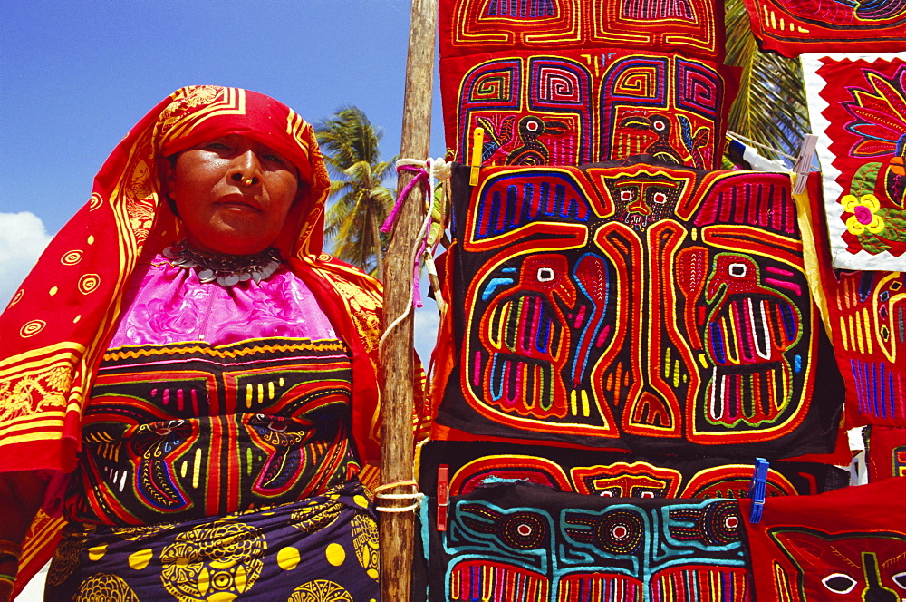 Cuna indian woman displays her molas (traditional garments), San Blas Islands, Panama, Central America