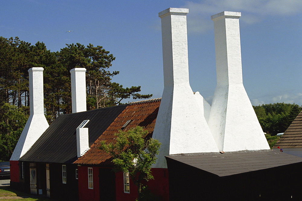 Bornholm smokehouse chimneys, where herrings are smoked, at Allinge, Bornholm, Denmark, Scandinavia, Europe