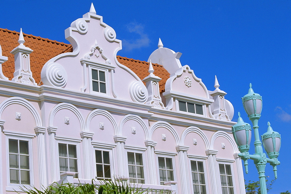 Pastel facade of mock Dutch colonial building, Oranjestad, Aruba, Antilles, Central America