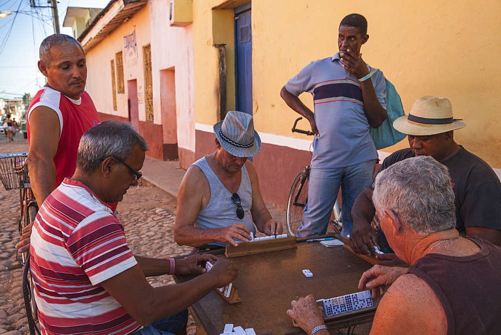 People playing Dominoes in street, Trinidad, Cuba, West Indies, Caribbean, Central America