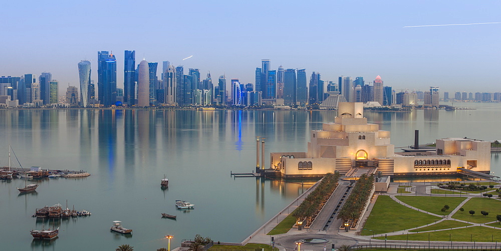 Museum of Islamic Art with West Bay skyscrapers in background, Doha, Qatar, Middle East