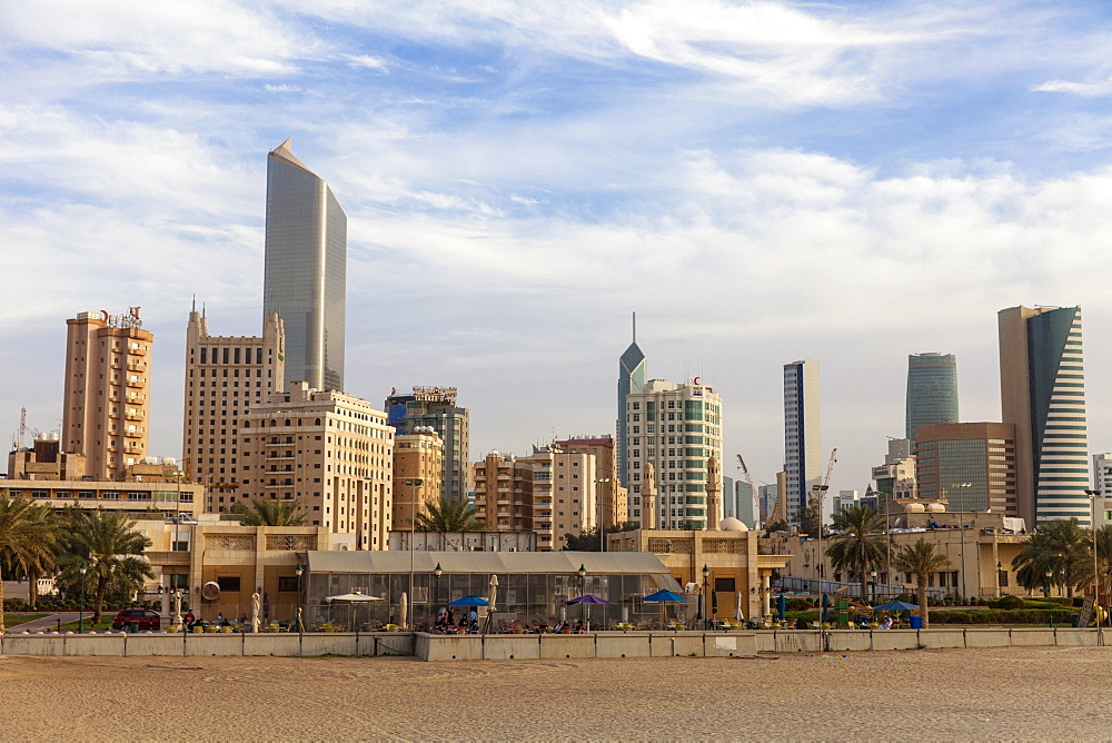 Looking towards city center buildings from a beach on Arabian Gulf Street, Sharq, Kuwait City, Kuwait, Middle East