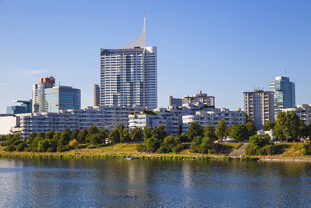 Donau City reflecting in New Danube River, Vienna, Austria, Europe