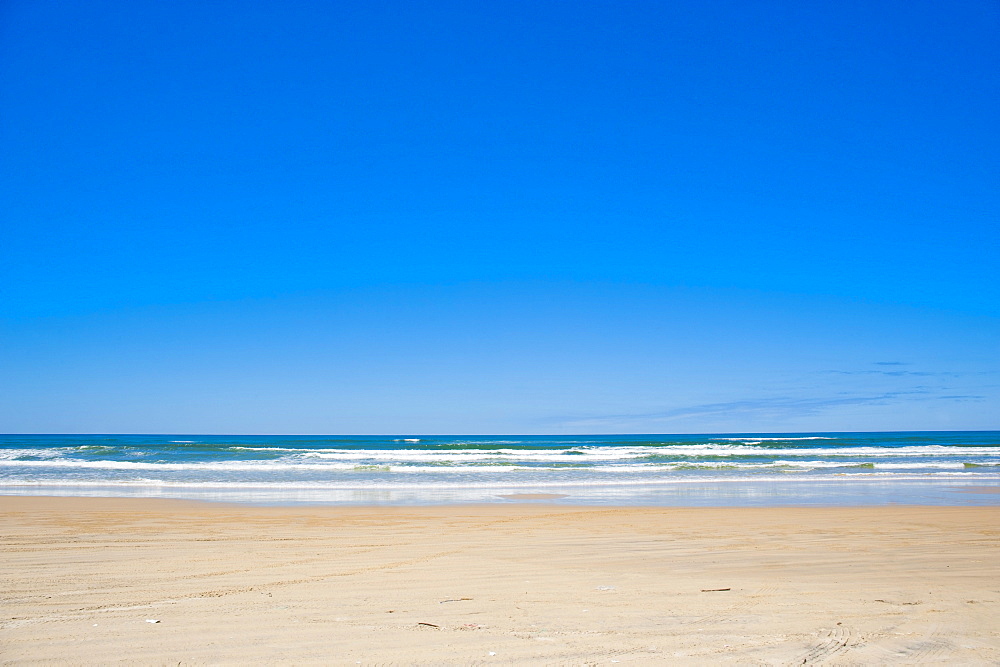 Seventy Five Mile Beach with white sand and blue skies, Fraser Island, UNESCO World Heritage Site, Queensland, Australia, Pacific