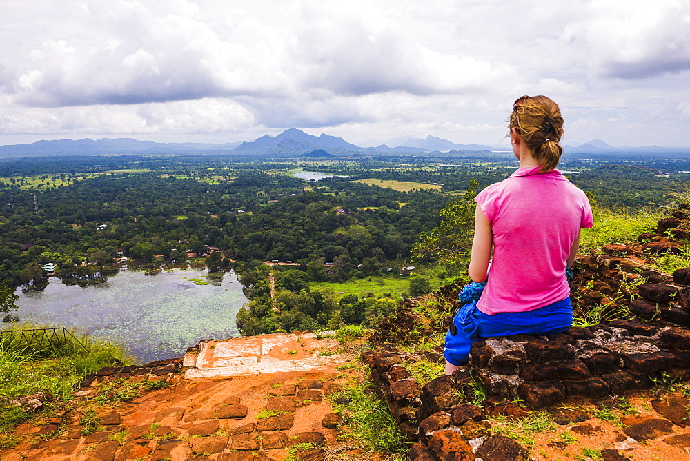 Sigiriya Rock, tourist enjoying the view over the Sri Lankan landscape, Sri Lanka, Asia 