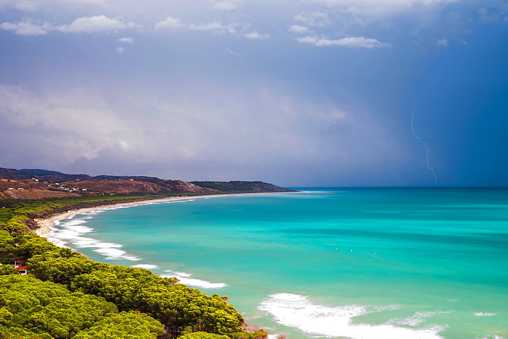 Thunder and lightning storm over Capo Bianco Beach and the Mediterranean Sea in the Province of Agrigento, Sicily, Italy, Europe