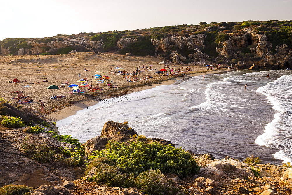 People on Calamosche Beach at sunset, near Noto, Vendicari Nature Reserve, South East Sicily, Italy, Mediterranean, Europe 