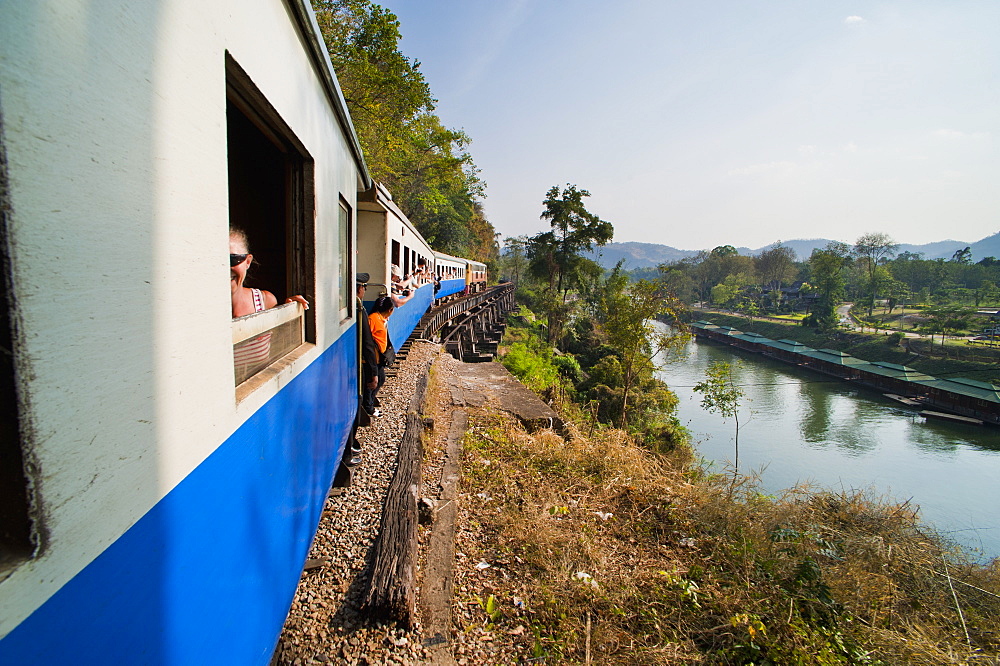 Tourists on a train ride on the Death Railway along the River Kwai, Kanchanaburi, Thailand, Southeast Asia, Asia