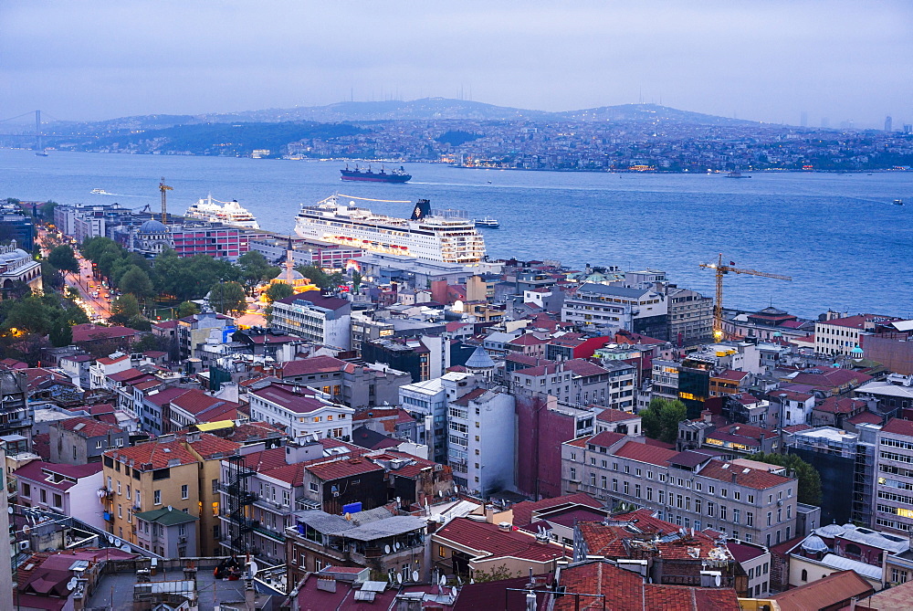 Bosphorus Strait and cruise ship at night seen from Galata Tower, Istanbul, Turkey, Europe