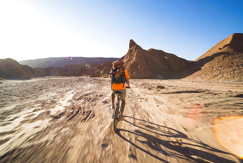 Cycling in the Devil's ravine (Quebrada Del Diablo), part of the Katarpe Valley, San Pedro de Atacama, Atacama Desert, North Chile, Chile, South America