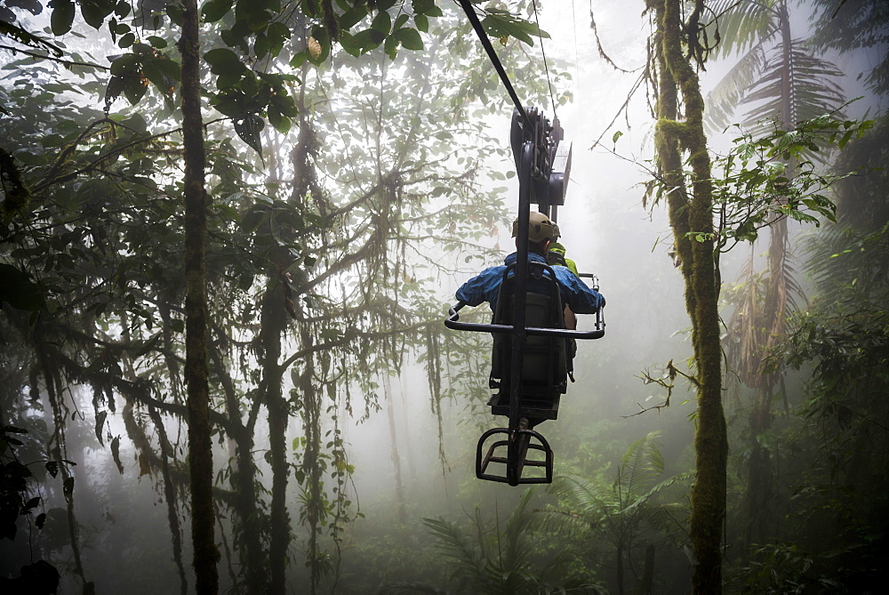 Mashpi Lodge Sky Bike on a misty morning in the Choco Rainforest, an area of Cloud Forest in Pichincha Province, Ecuador, South America