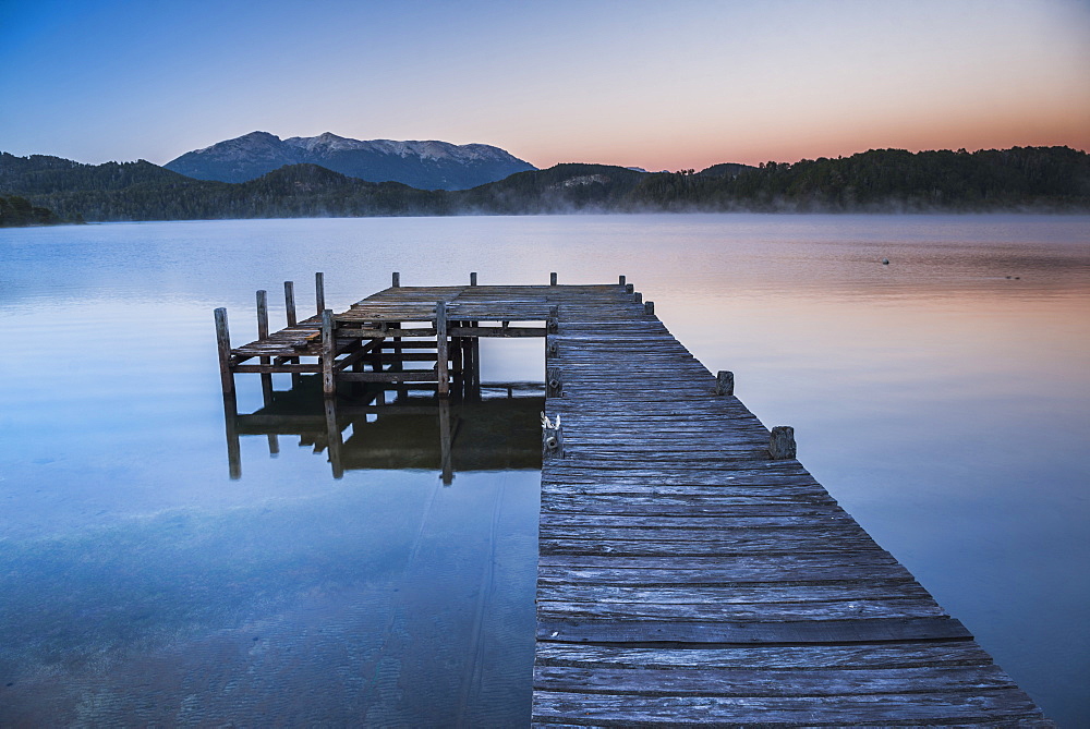 Pier on Lake Nahuel Huapi during a misty sunrise, Villa la Angostura, Neuquen, Patagonia, Argentina, South America