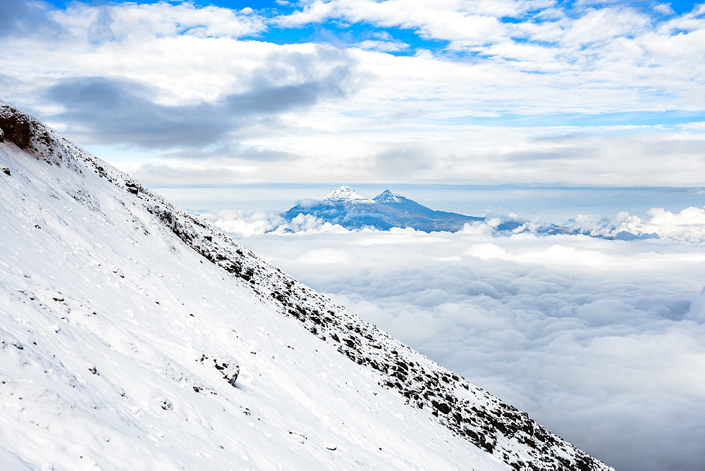 Volcanoes of Illiniza Norte, 5126m on left and Illiniza Sur, 5248m on right, seen from Cotopaxi Volcano, Cotopaxi Province, Ecuador, South America