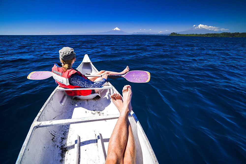 Kayaking on Llanquihue Lake with Osorno Volcano behind, Puerto Varas, Chile Lake District, Chile, South America