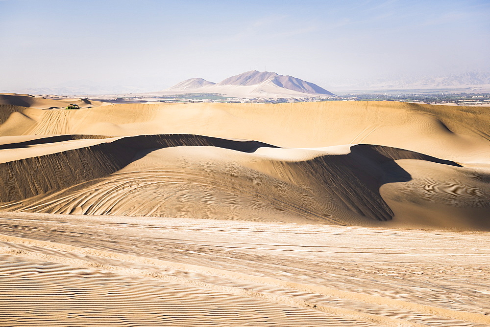 Sand dunes in the desert at Huacachina, Ica Region, Peru, South America