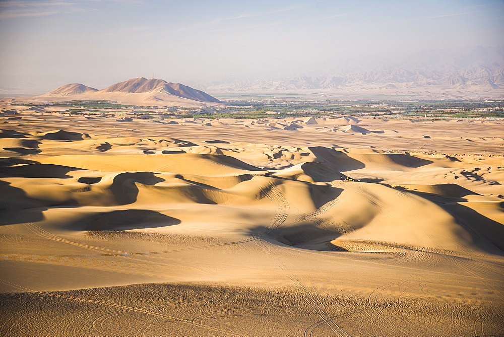 Sand dunes in the desert at Huacachina, Ica Region, Peru, South America