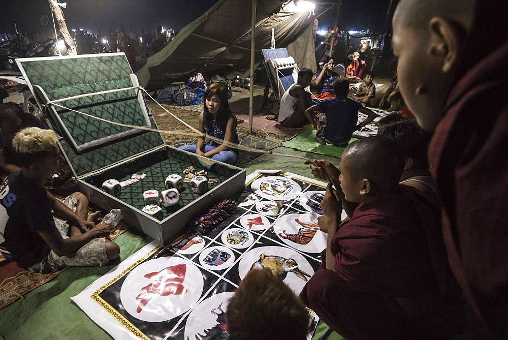 Mrauk U, monks gambling at Dung Bwe Festival for the passing of an important Buddhist Monk, Rakhine State, Myanmar (Burma), Asia