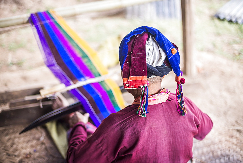 Palaung woman weaving, part of the Palau Hill Tribe near Hsipaw Township, Shan State, Myanmar (Burma), Asia